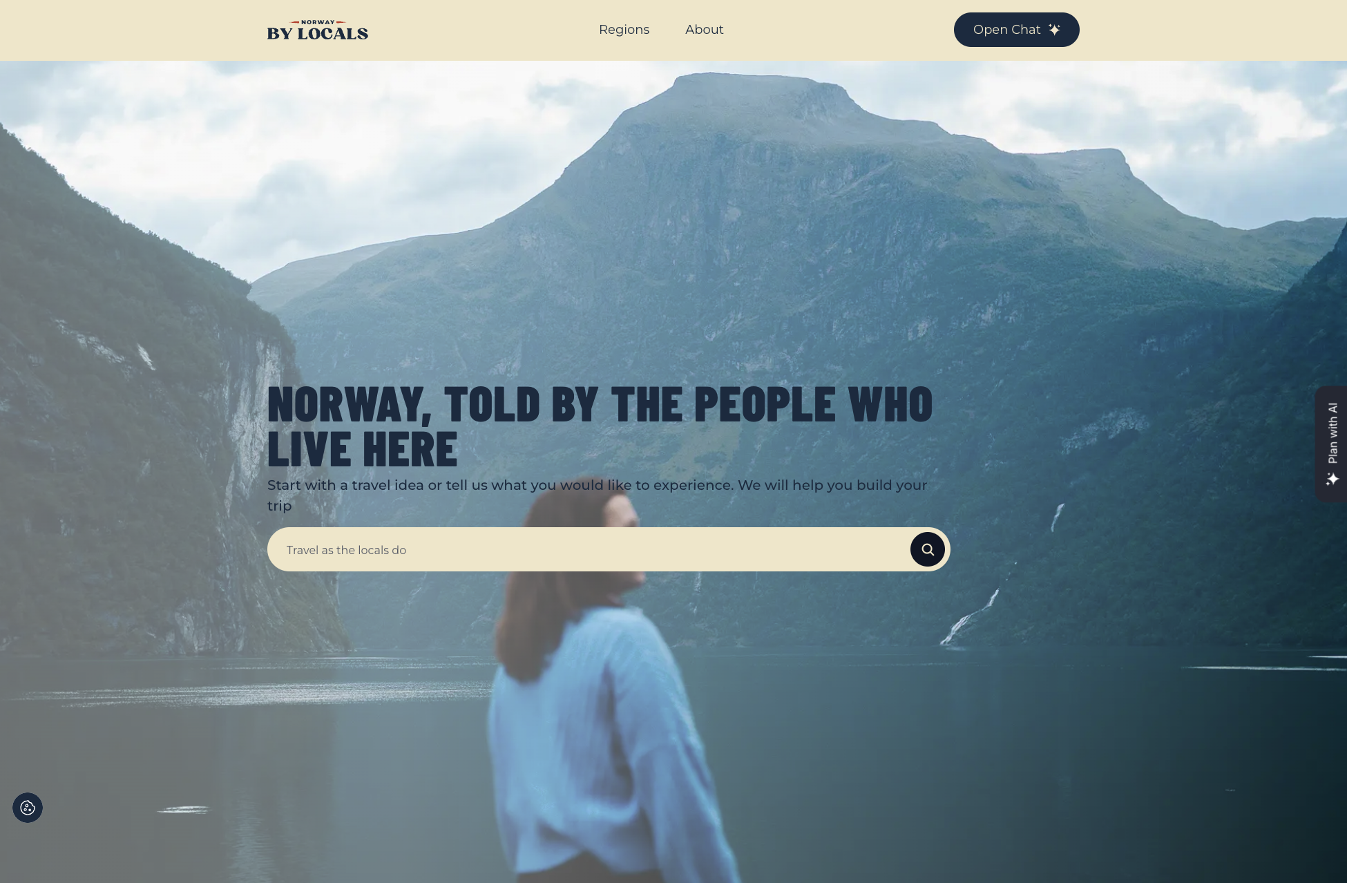 Forsiden til Norway by Locals med overskriften «Norway, told by the people who live here», over et bilde av en kvinne som ser utover en fjord med bratte fjell.